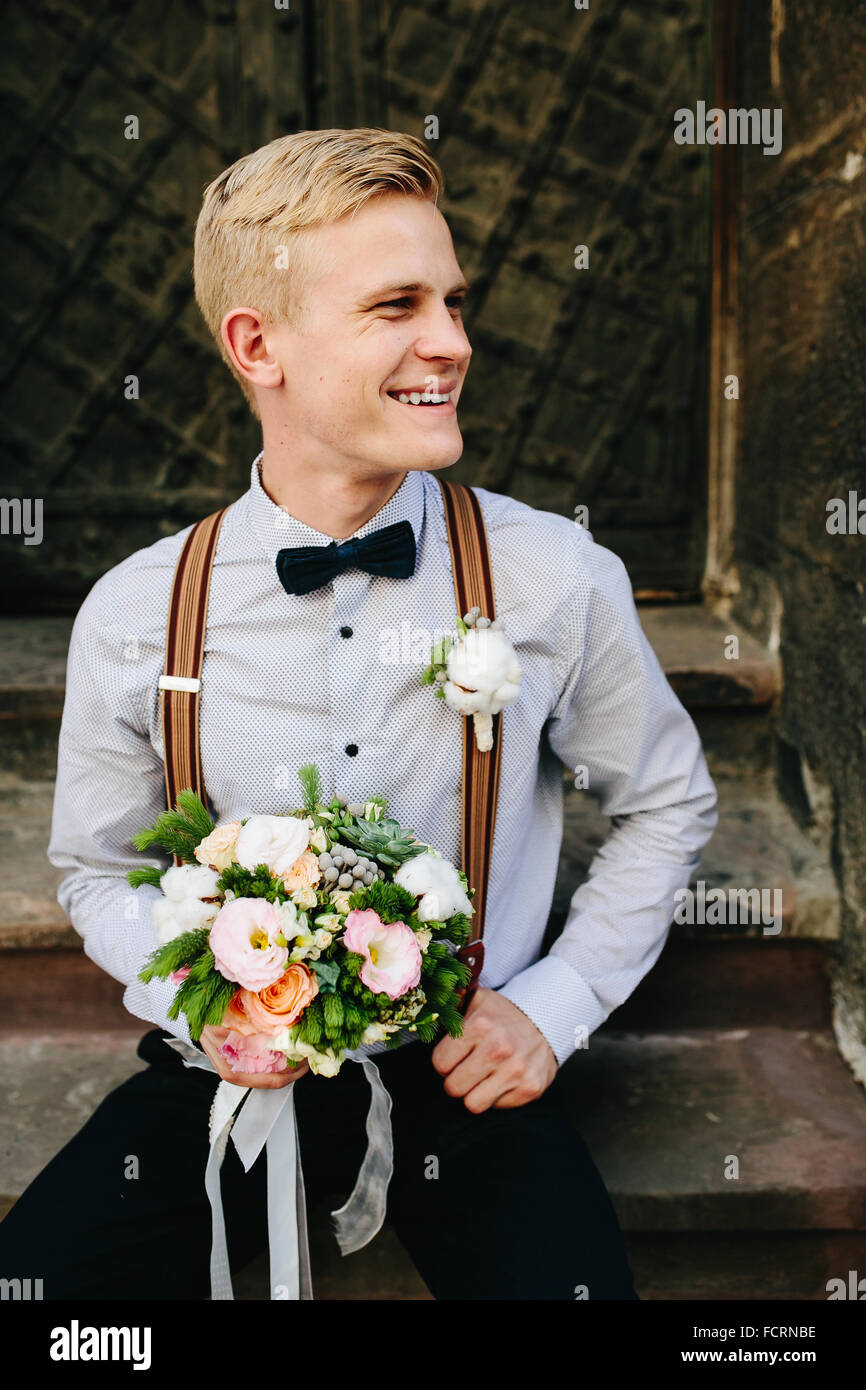 bride sitting on stone steps Stock Photo - Alamy