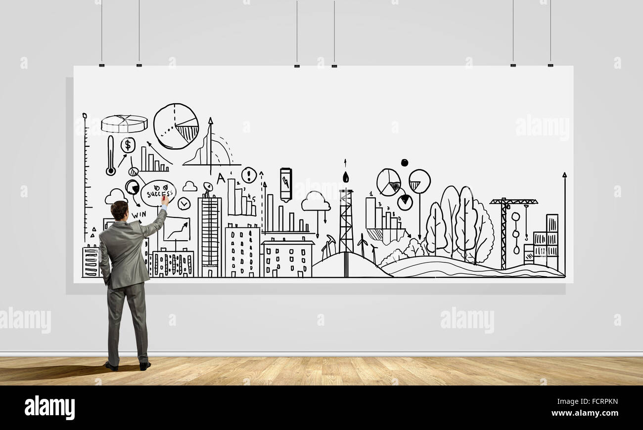 Rear view of businessman drawing business plan on white banner Stock ...