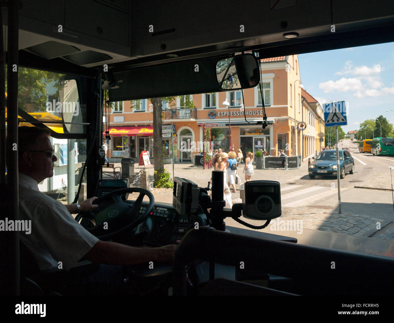 A Bus Driver Seated And Driving A Skanetrafiken Bus In Angelholm Stock Photo Alamy
