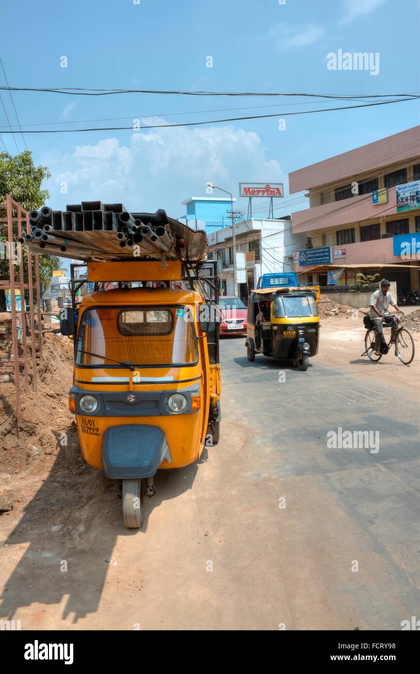 Street Scene with Rickshaw and other Traffic, Trivandrum Kerala, India Stock Photo