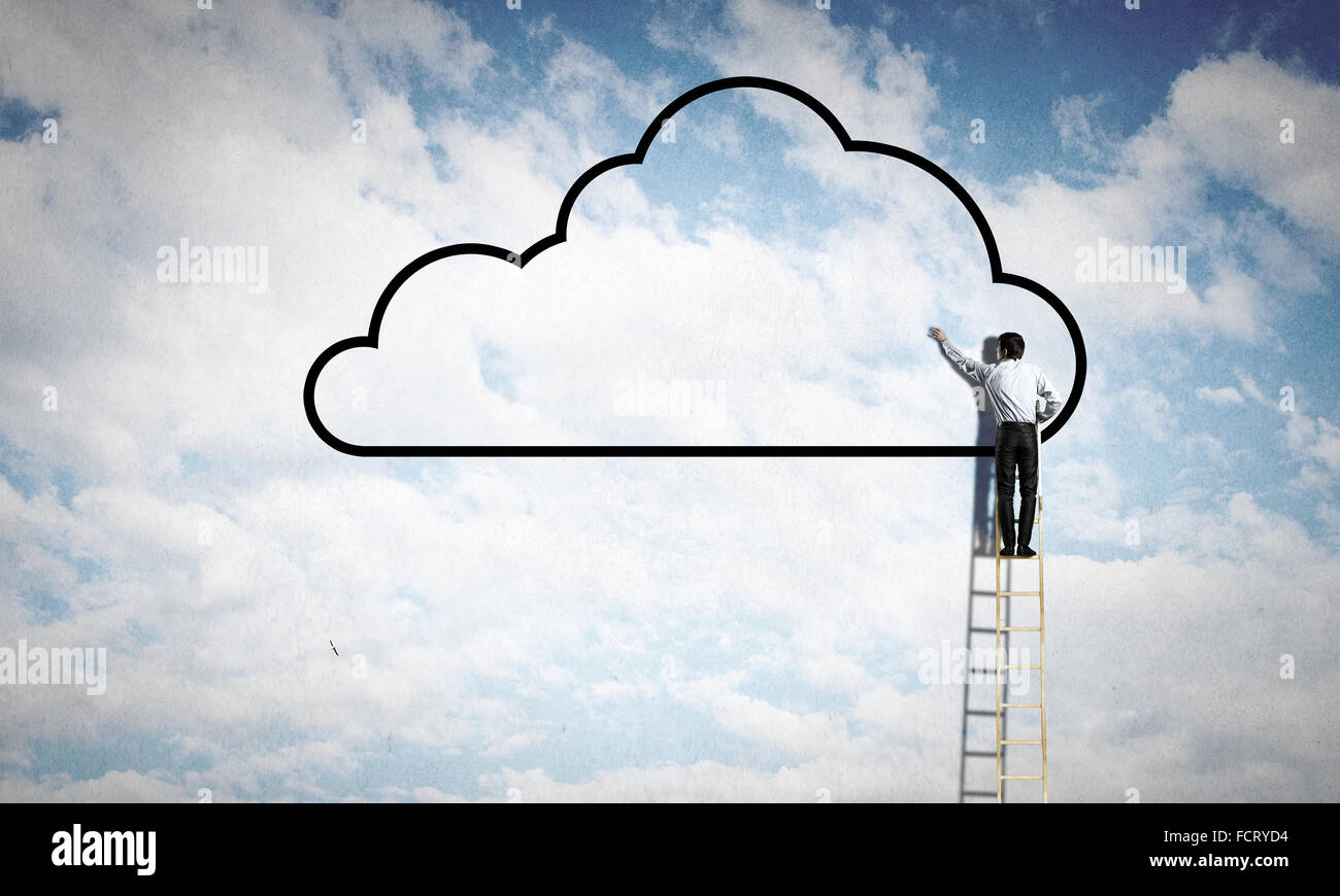 Back view of businessman standing on ladder and reaching to cloud Stock ...