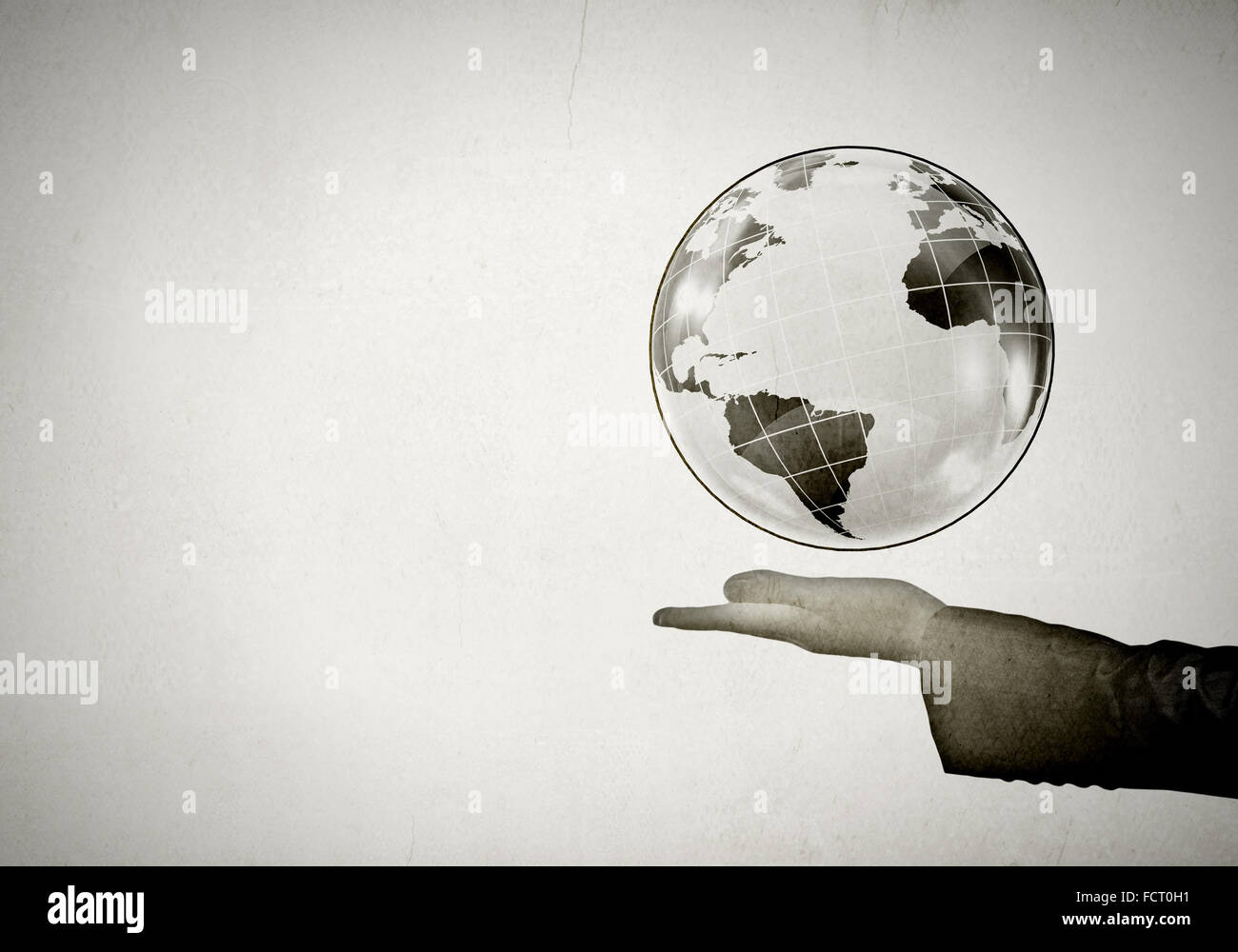 Man's hand holding digital Earth planet representing global ...
