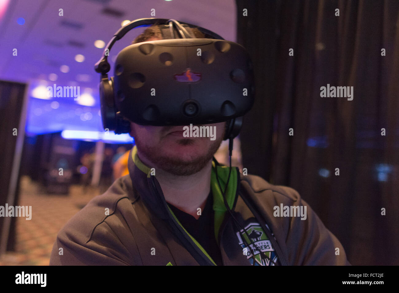 Los Angeles, USA - January 23, 2016: Man tries virtual reality headset during VRLA Expo Winter, virtual reality exposition, at t Stock Photo