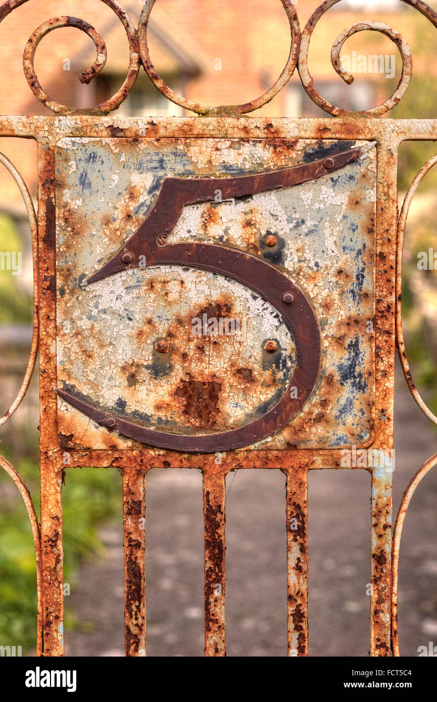 Rusting Wrought Iron No 5 Sign on Metal Gate, Grunge Stock Photo Alamy