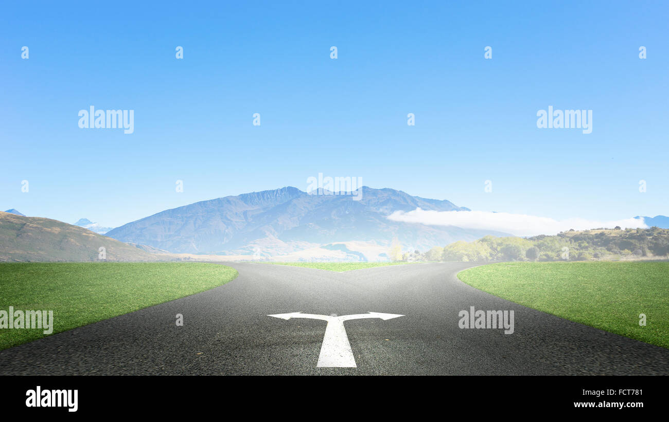 Concept of choice with crossroads spliting in two ways Stock Photo