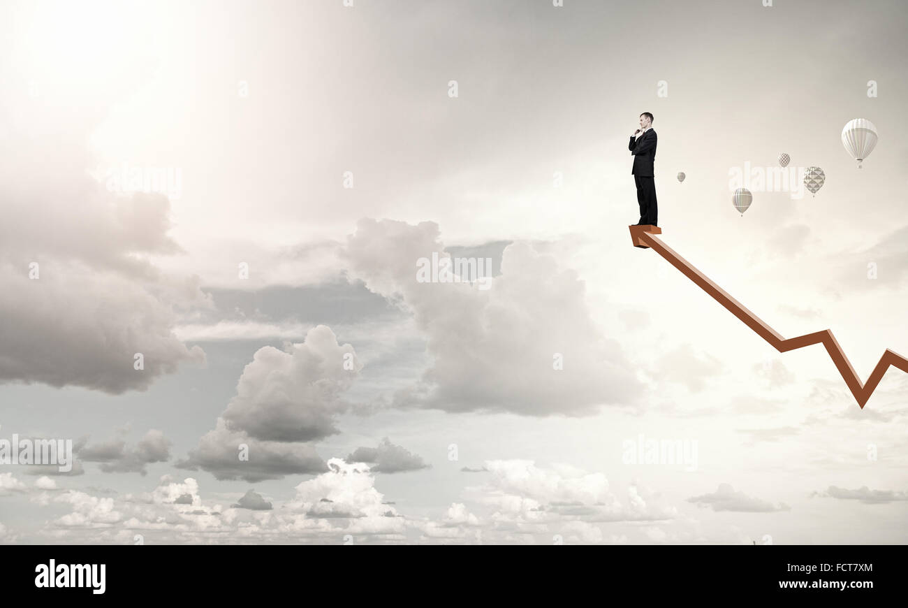 Confident businessman with his arms crossed on chest Stock Photo Alamy