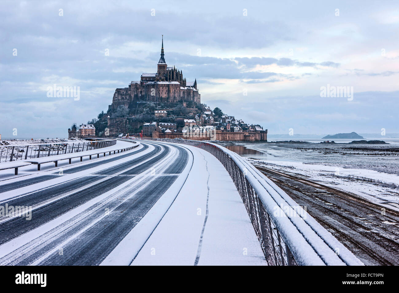 Mont Saint-Michel (Saint Michael's Mount), (Normandy, north-western France), on 2015/02/03: snowfall on the island commune Mont Stock Photo