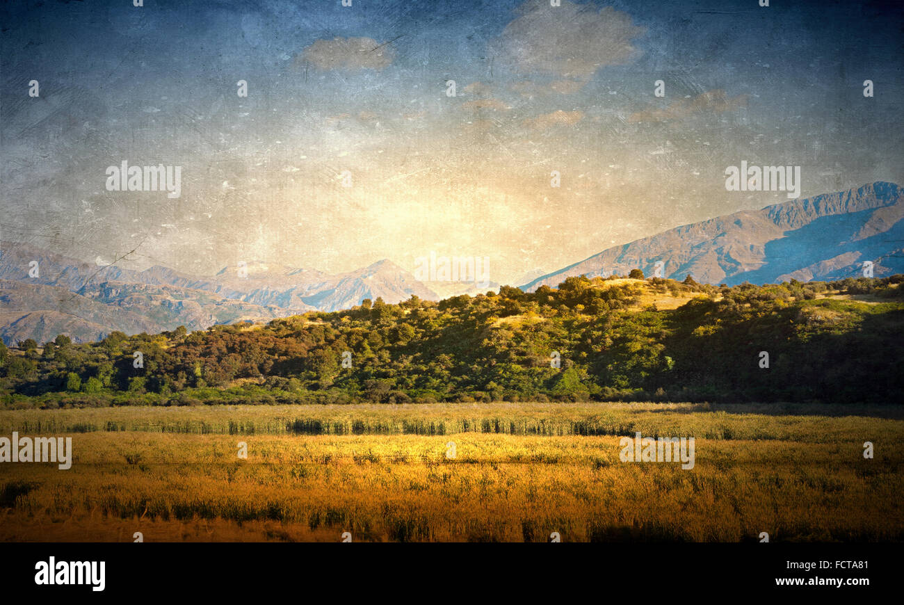 Natural mountain landscape in old grunge style Stock Photo - Alamy