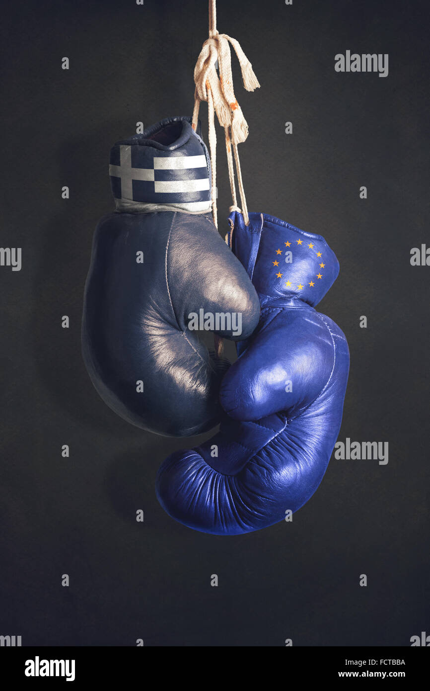 Boxing gloves as a symbol of EU vs. Greece Stock Photo