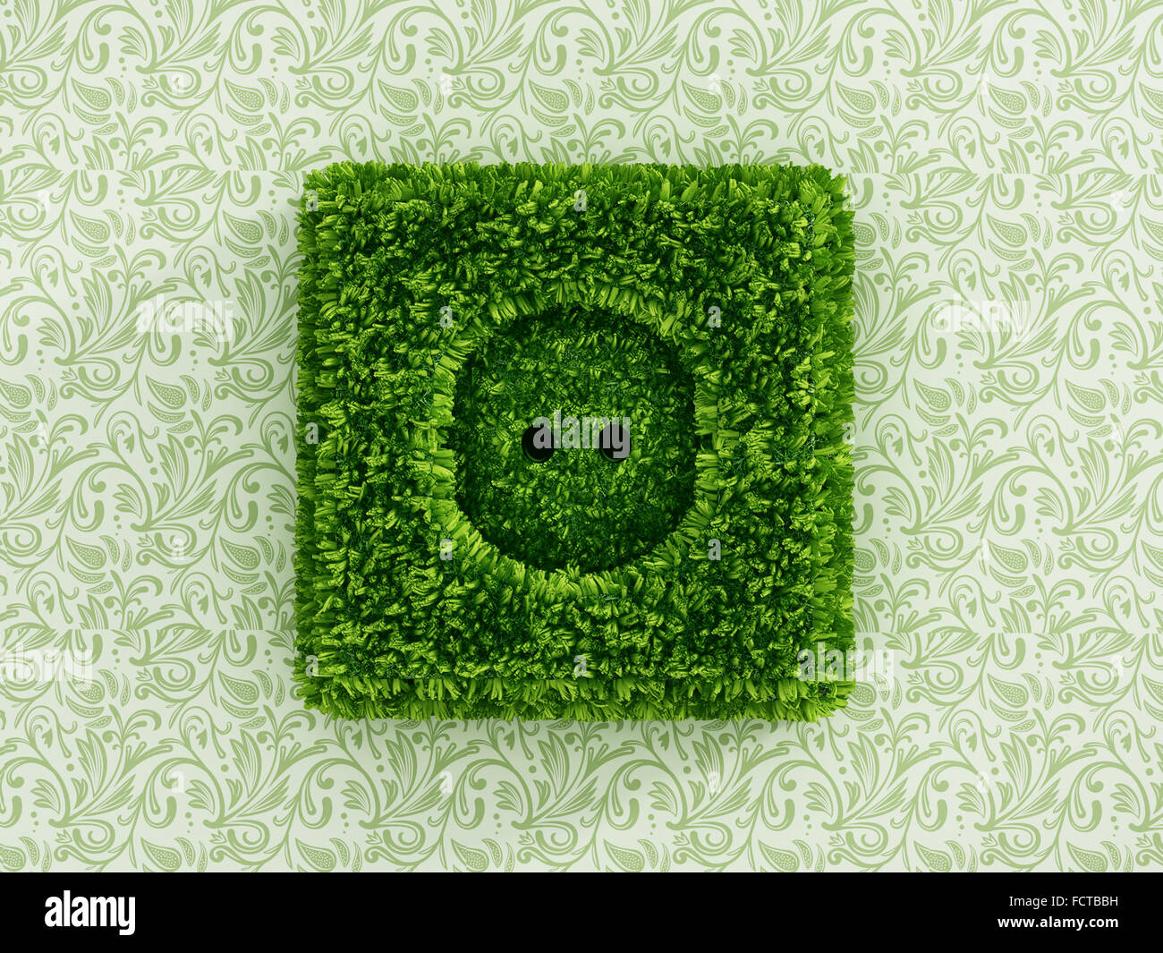 Power outlet covered with green grass Stock Photo