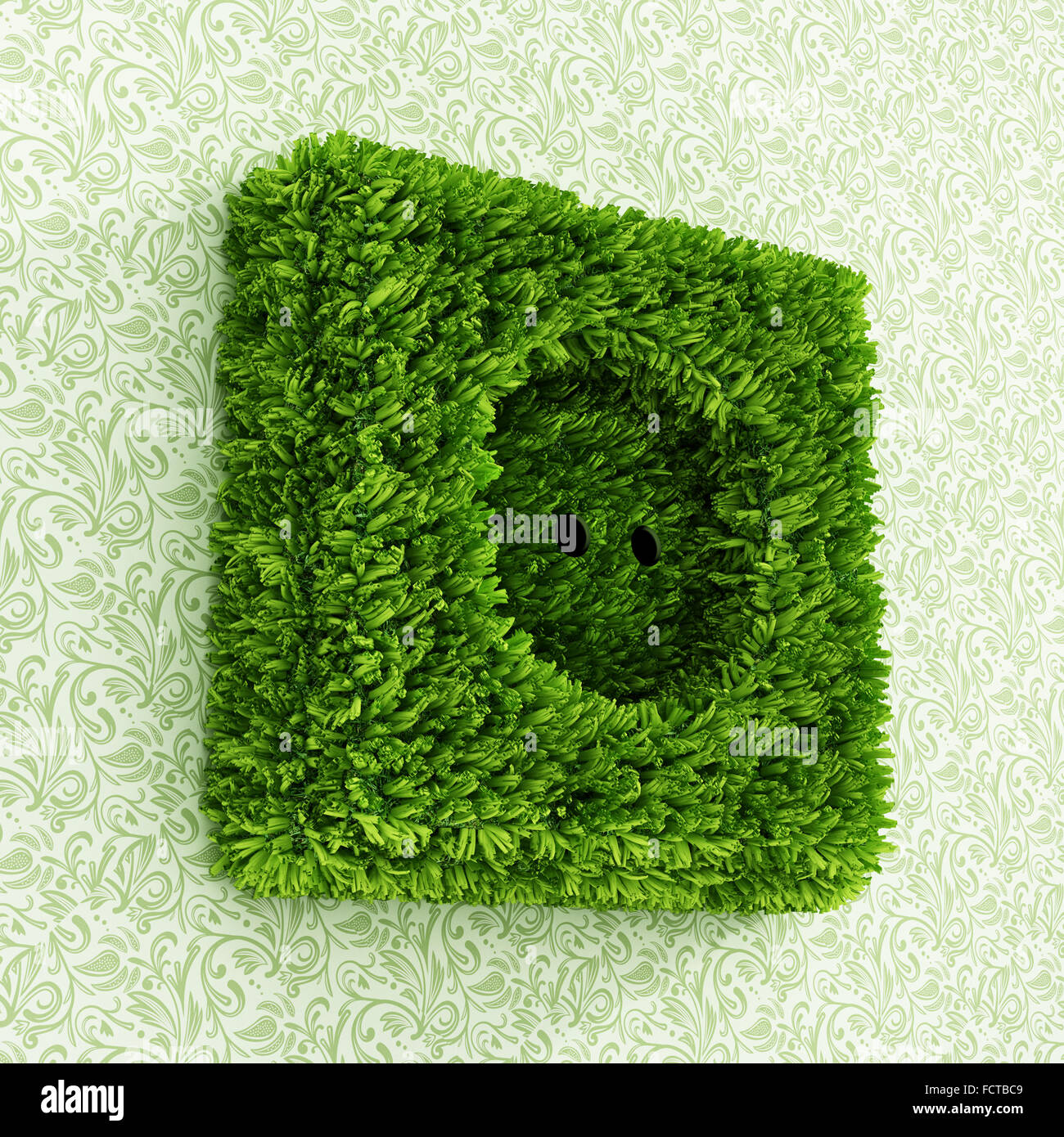 Power outlet covered with green grass Stock Photo