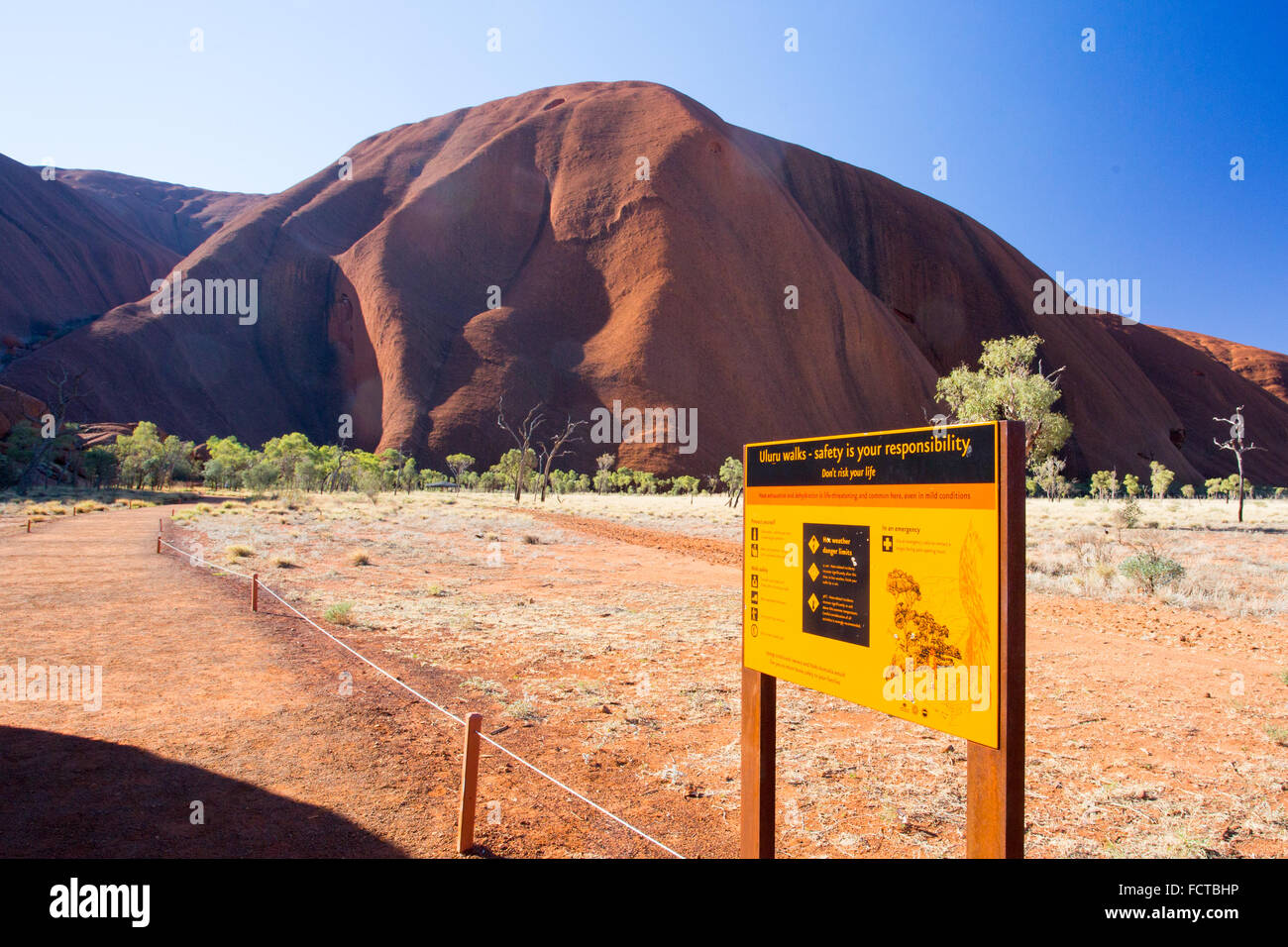 The southern face of Uluru on the Kuniya walk on a clear winter's afternoon in the Northern Territory, Australia Stock Photo