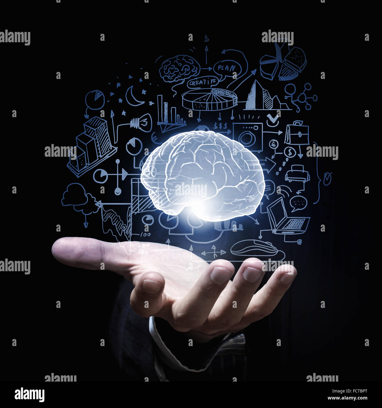 Close up of businessman hand holding brain in palm Stock Photo - Alamy