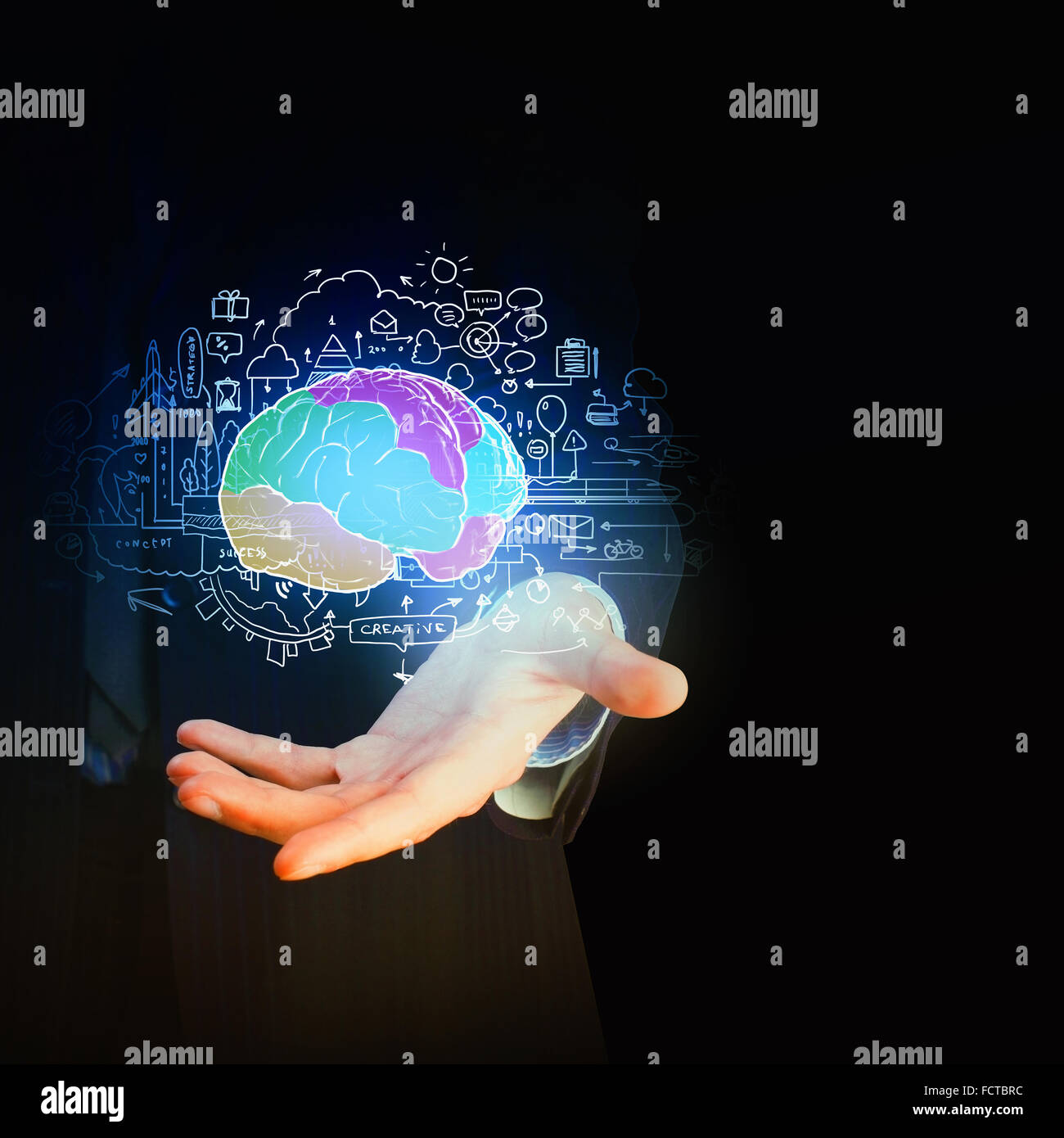 Close up of businessman hand holding brain in palm Stock Photo - Alamy
