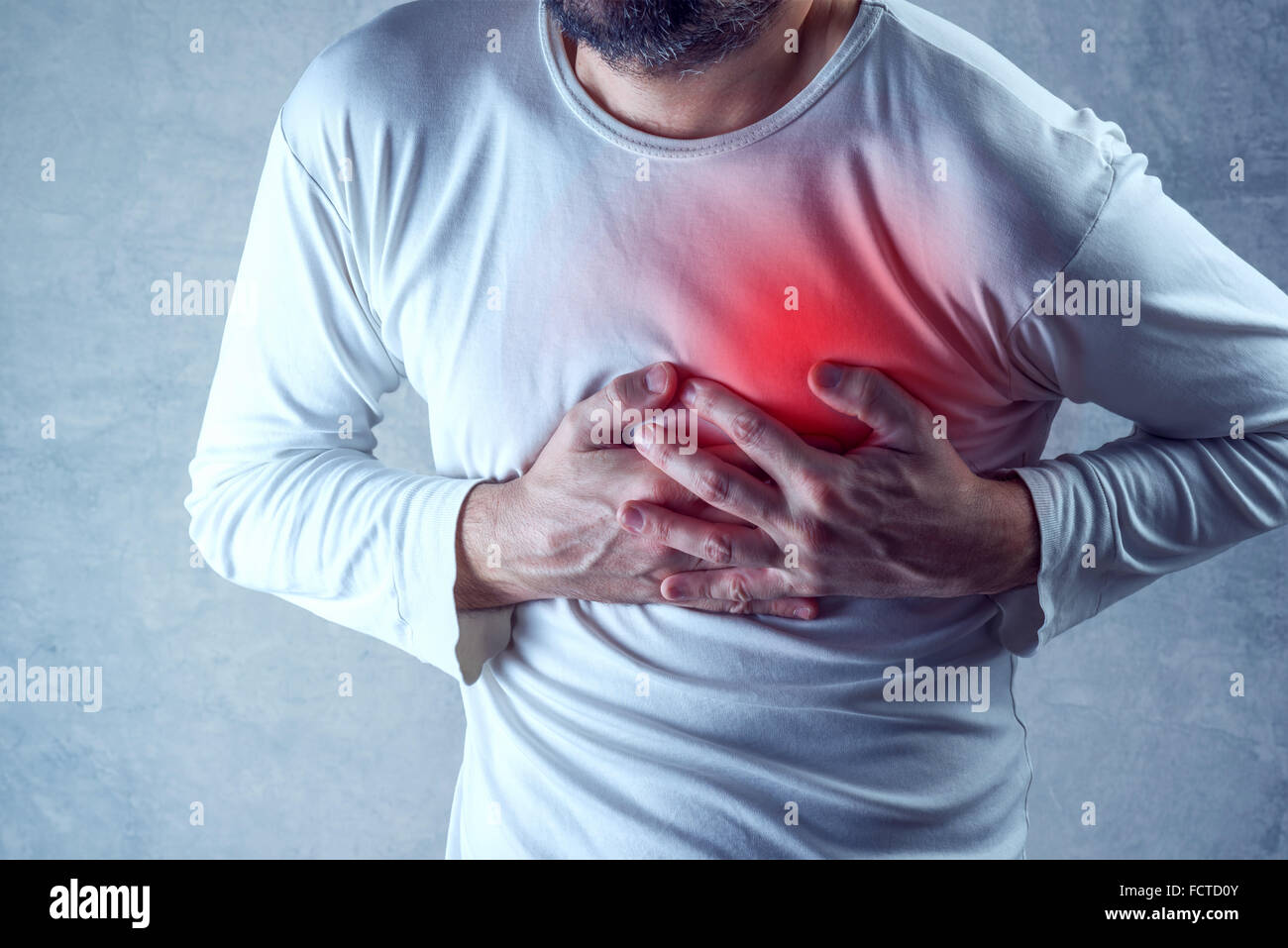 Severe heartache, man suffering from chest pain, having heart attack or