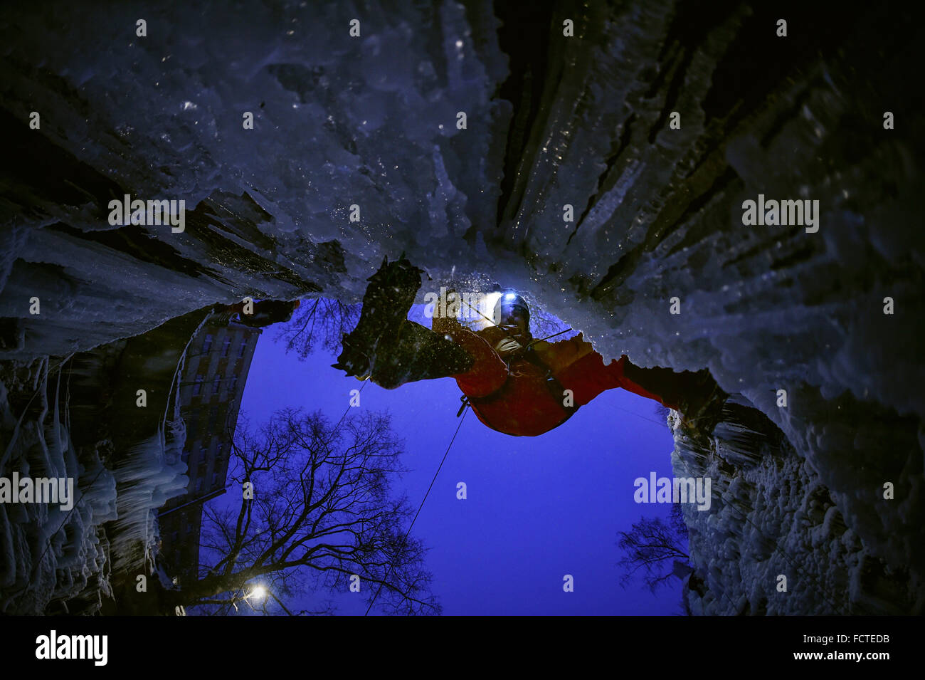 Prague, Czech Republic. 23rd Jan, 2015. An iceclimber climbs on an