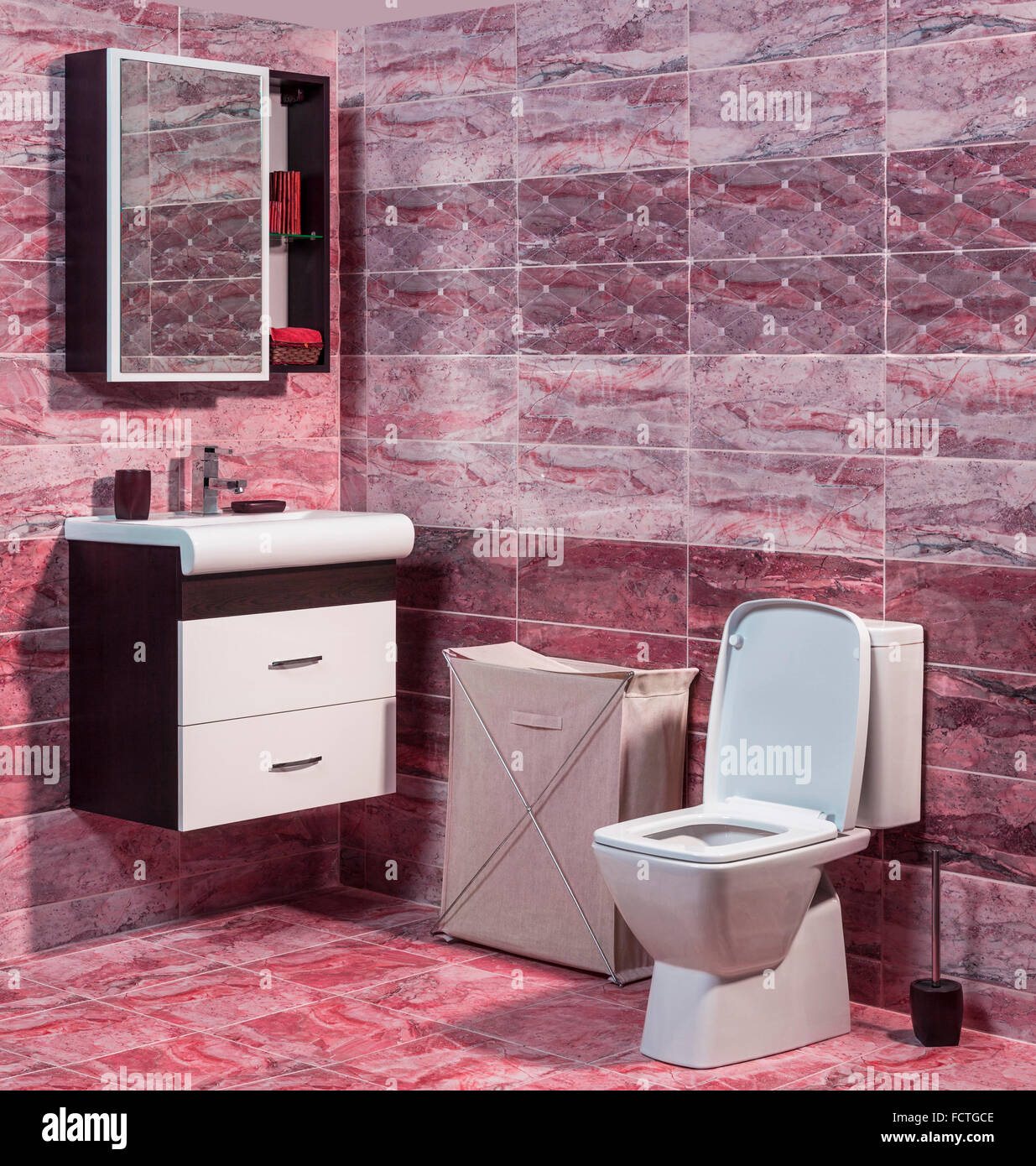 Inside of fashionable bathroom toilet and sink and modern ceramic