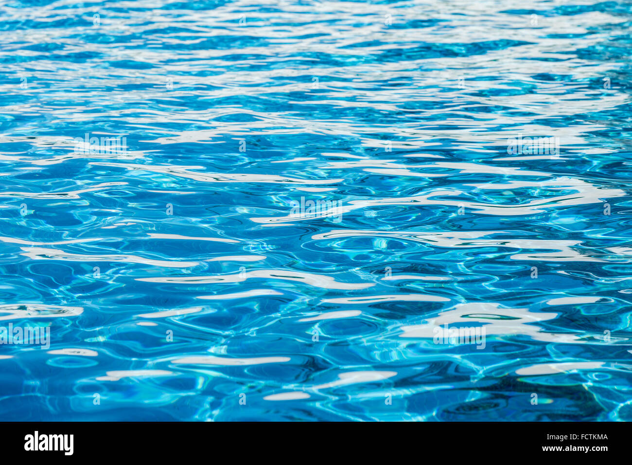 Ripples on the water in the swimming pool. Stock Photo