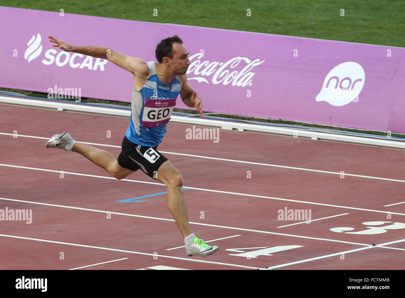 Nika Kartavtsevi (GEO) wins his Men's 100m heat. Athletics. Olympic Stadium. Baku2015. 1st European Games. Baku. Azerbaijan. 21/06/2015 Stock Photo