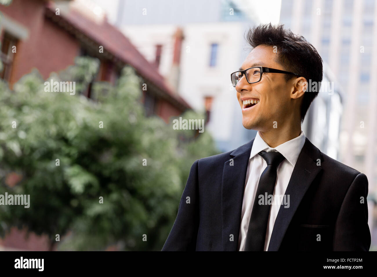 Businessman outdoors in city business district Stock Photo - Alamy