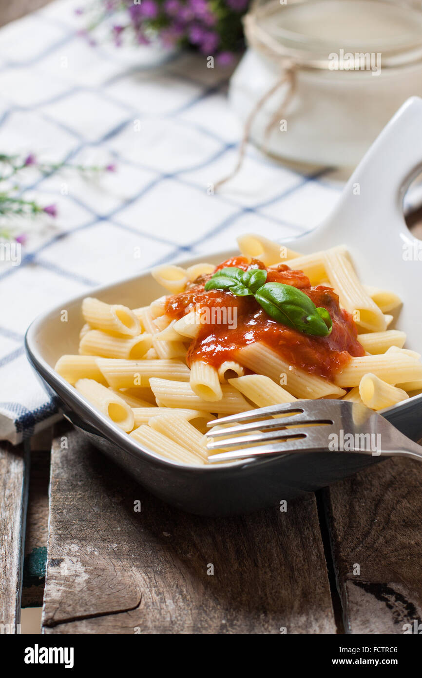 macaroni pasta with tomato sauce and basil Stock Photo - Alamy