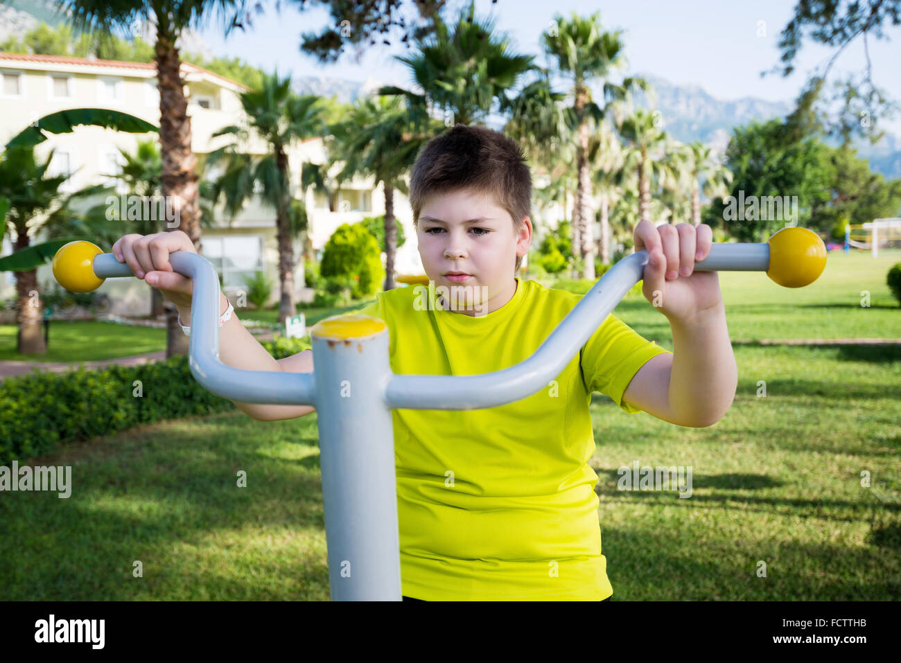 Boy doing fitness trainers on street Stock Photo Alamy