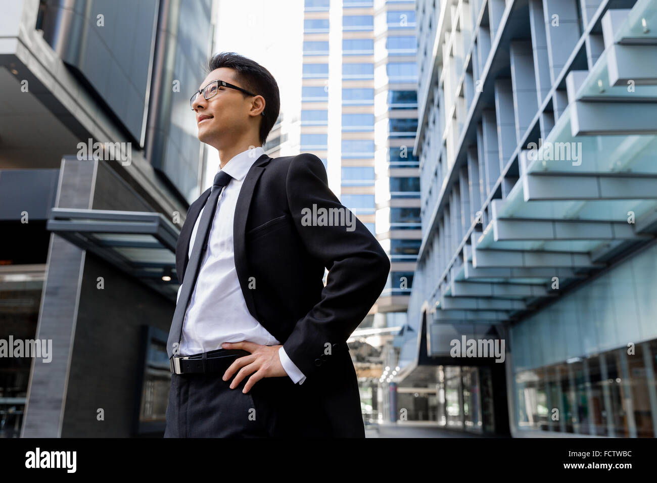 Businessman outdoors in city business district Stock Photo - Alamy