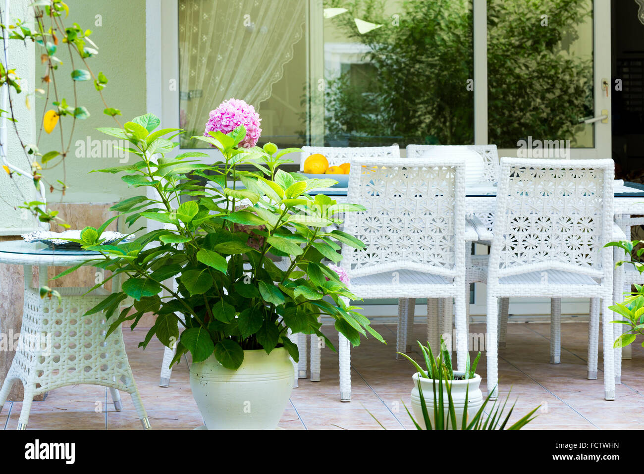 White garden furniture on the terrace Stock Photo - Alamy