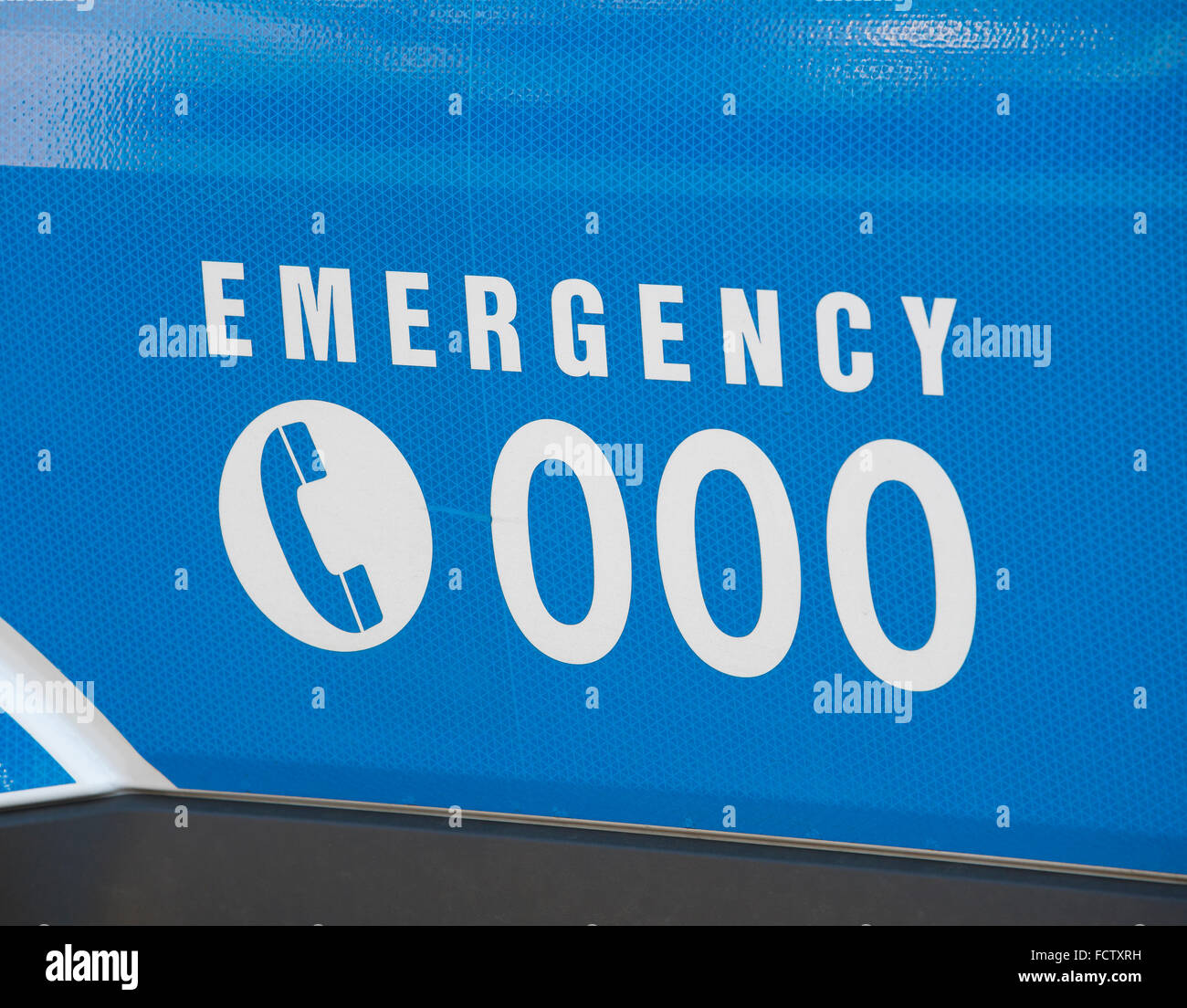 Emergency number 000 on an ambulance Stock Photo