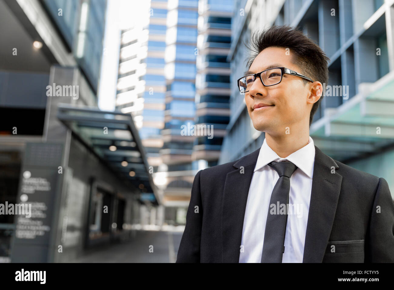 Businessman outdoors in city business district Stock Photo - Alamy