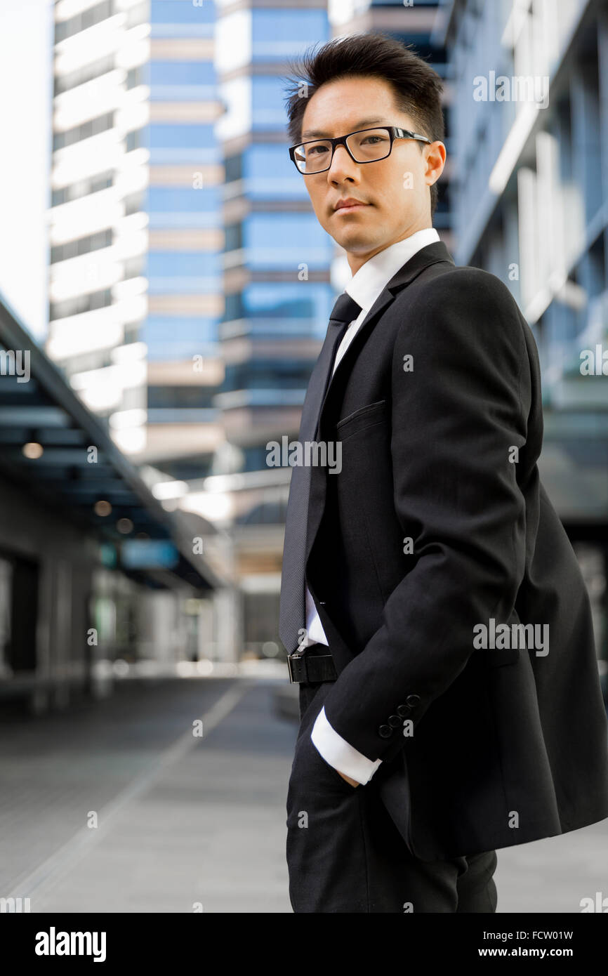 Businessman outdoors in city business district Stock Photo - Alamy