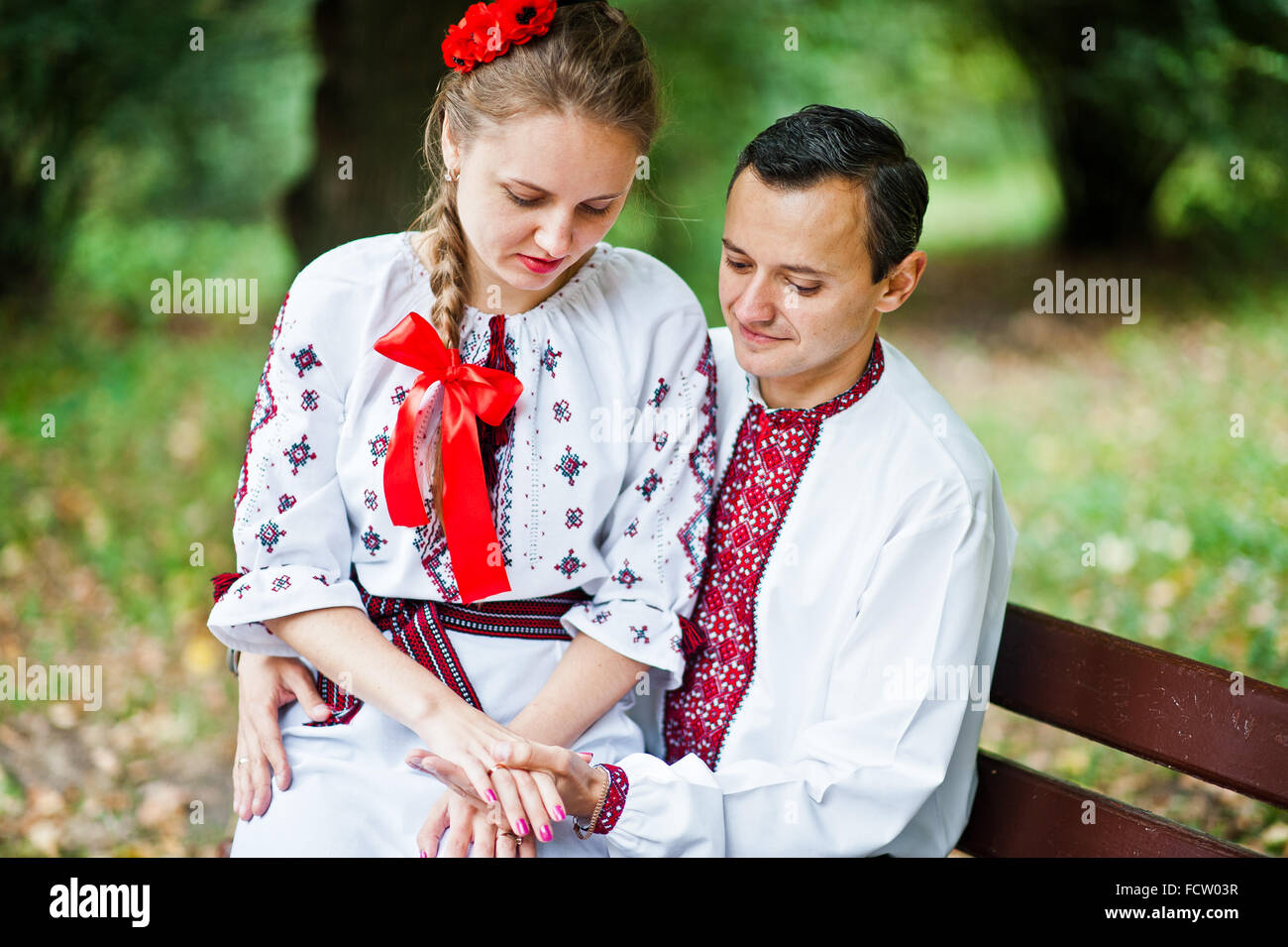 Couple on traditional dress in love Stock Photo Alamy