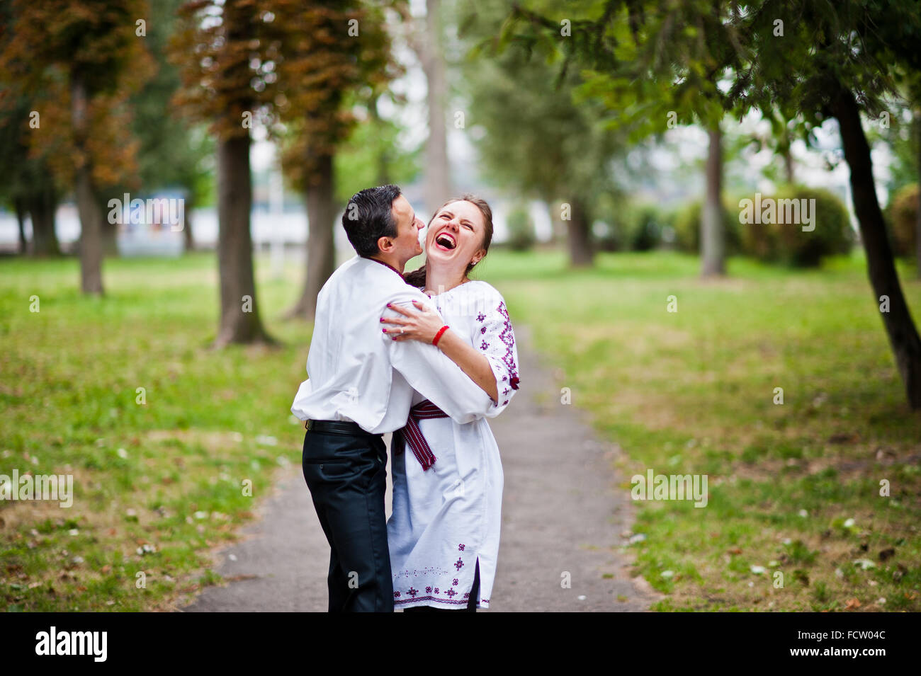 Couple on traditional dress in love Stock Photo Alamy