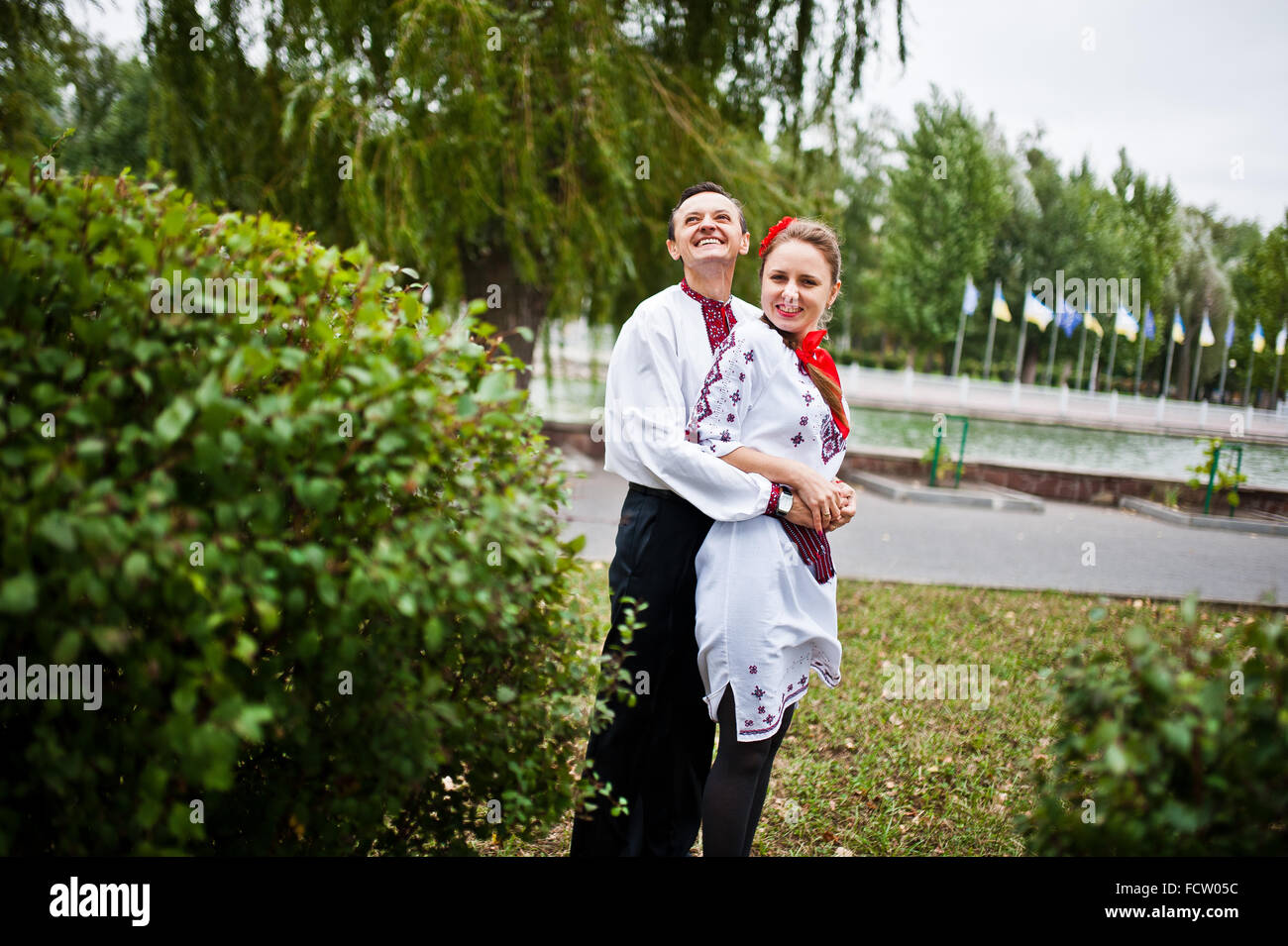 Couple on traditional dress in love Stock Photo Alamy