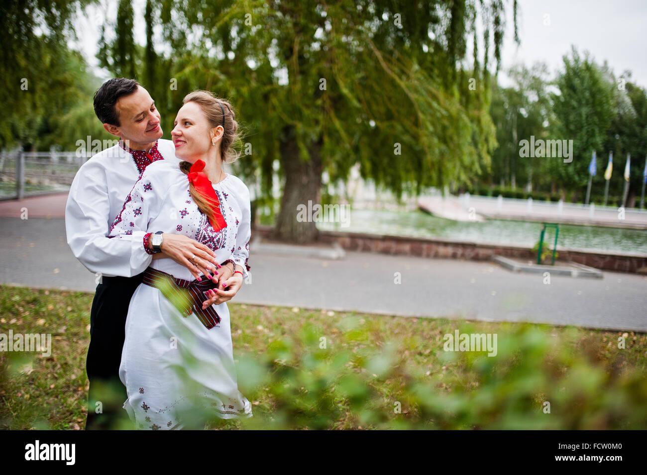 Couple on traditional dress in love Stock Photo Alamy