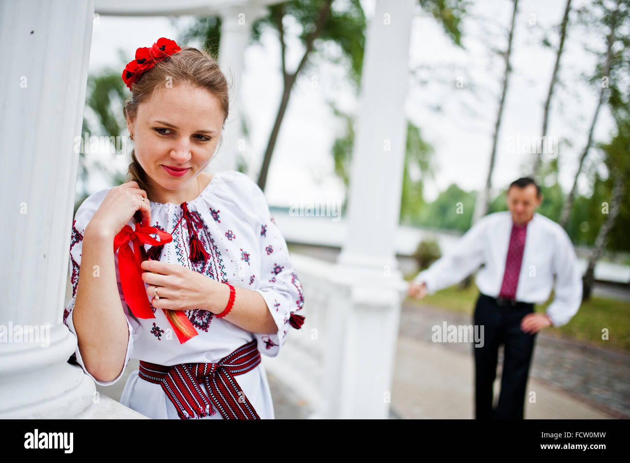 Couple on traditional dress in love Stock Photo Alamy
