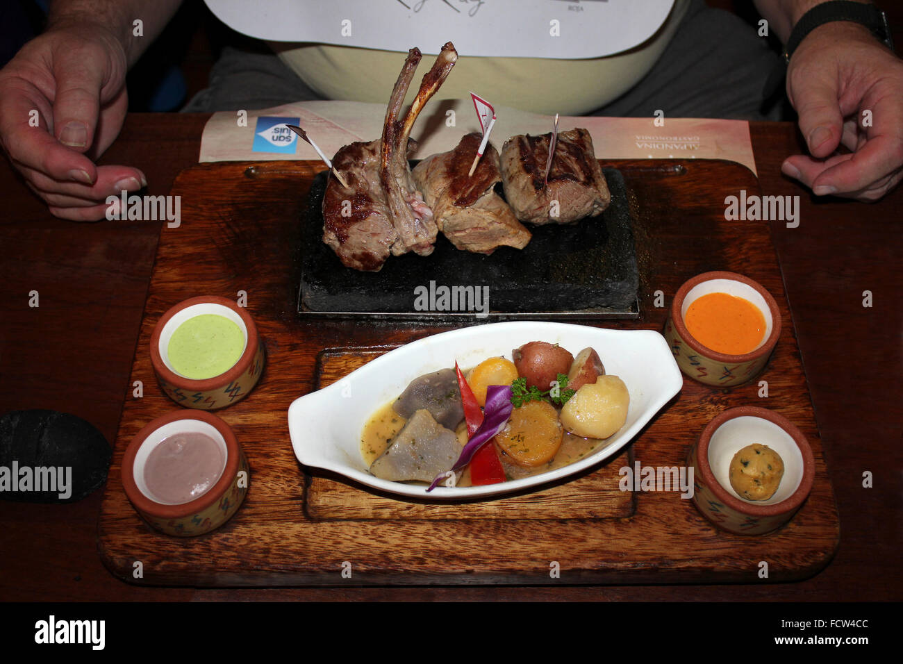 Traditional Three Meats Dish Served In A Restaurant In Arequipa, Peru Stock Photo