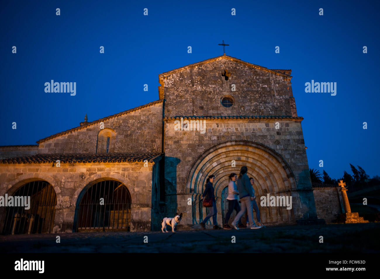 Cantabria, Spain. 24th Jan, 2016. the church of Santa Cruz in Castañeda (Cantabria) illuminated at dusk, this collegiate church is a jewel of Romanesque style of the twelfth century and this and was declared a national monument in 1930 Credit:  JOAQUIN GOMEZ SASTRE/Alamy Live News Stock Photo