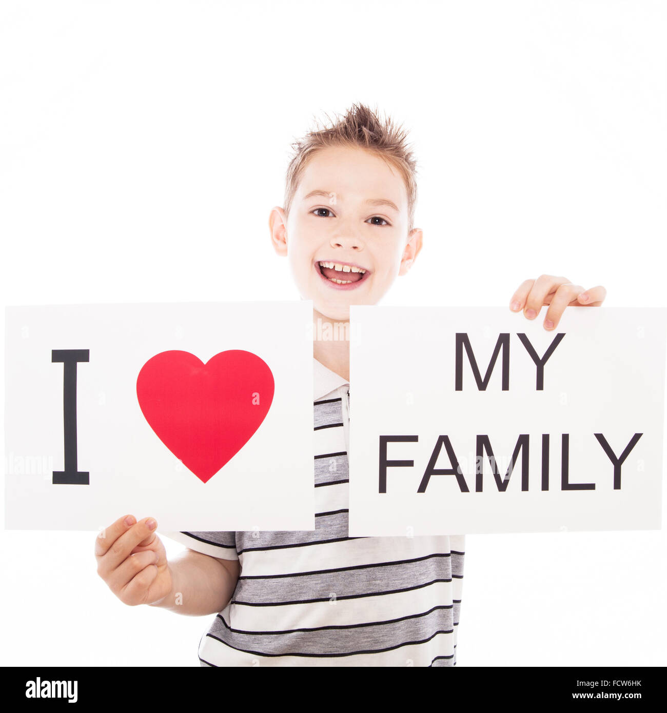 Happy boy with sign Stock Photo - Alamy