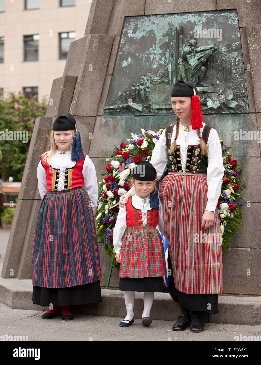 Mother and daughters dressed in traditional costumes, Icelandic Independence Day, Reykjavik, Iceland Stock Photo