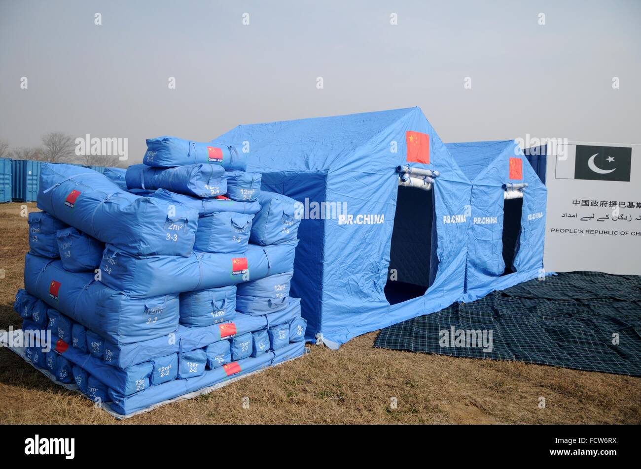 Islamabad. 25th Jan, 2016. Photo taken on Jan. 25, 2016 shows part of China's earthquake relief goods for Pakistan at a handover ceremony in Islamabad, capital of Pakistan. China on Monday handed over its second batch of relief goods worth 20 million yuan (3.05 million U.S. dollars) to Pakistan for the people affected by a 7.8-magnitude earthquake which hit the country on Oct. 26 last year. © Ahmad Kamal/Xinhua/Alamy Live News Stock Photo