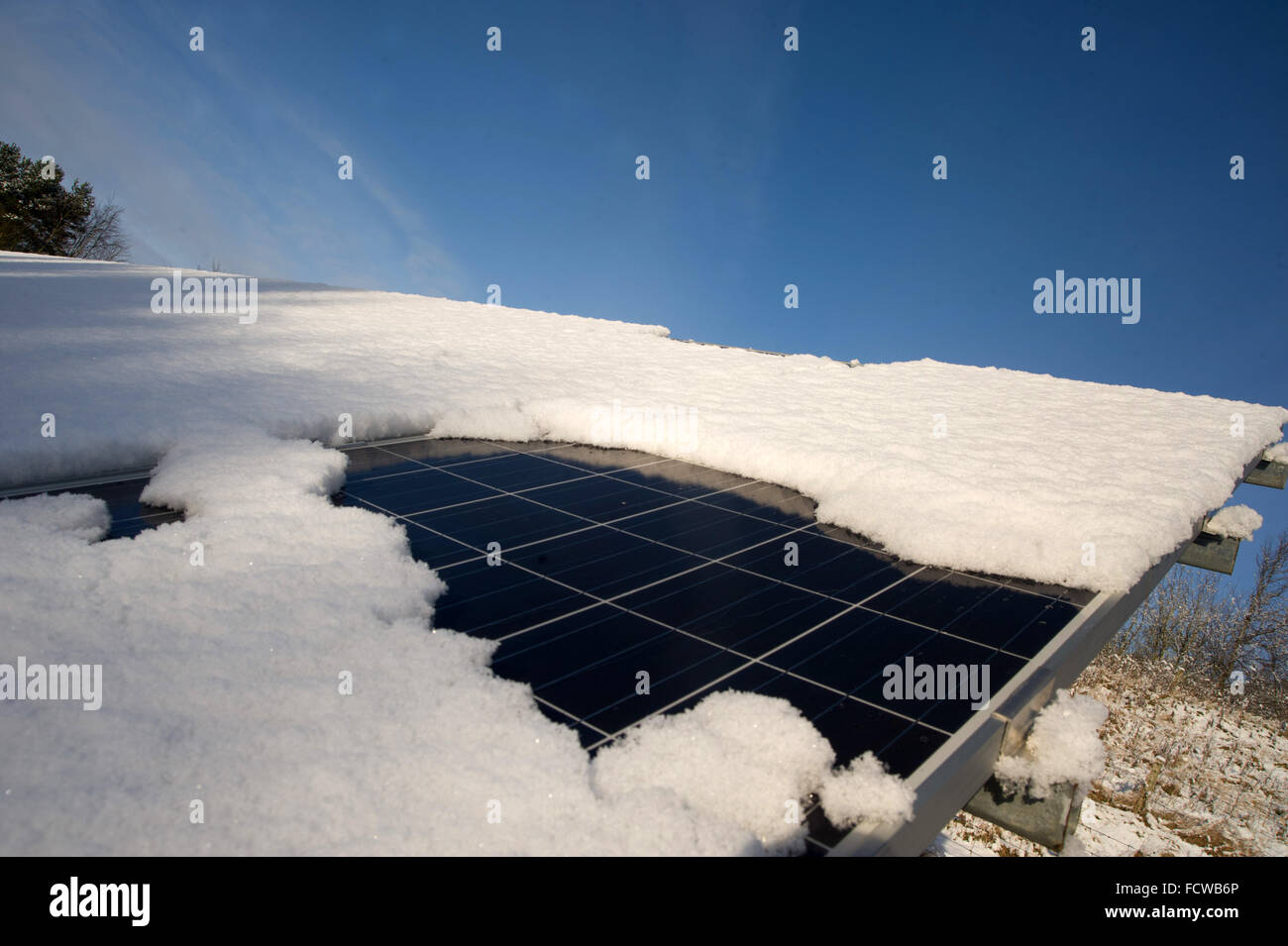 Snow covered solar panels, Northumberland Stock Photo Alamy