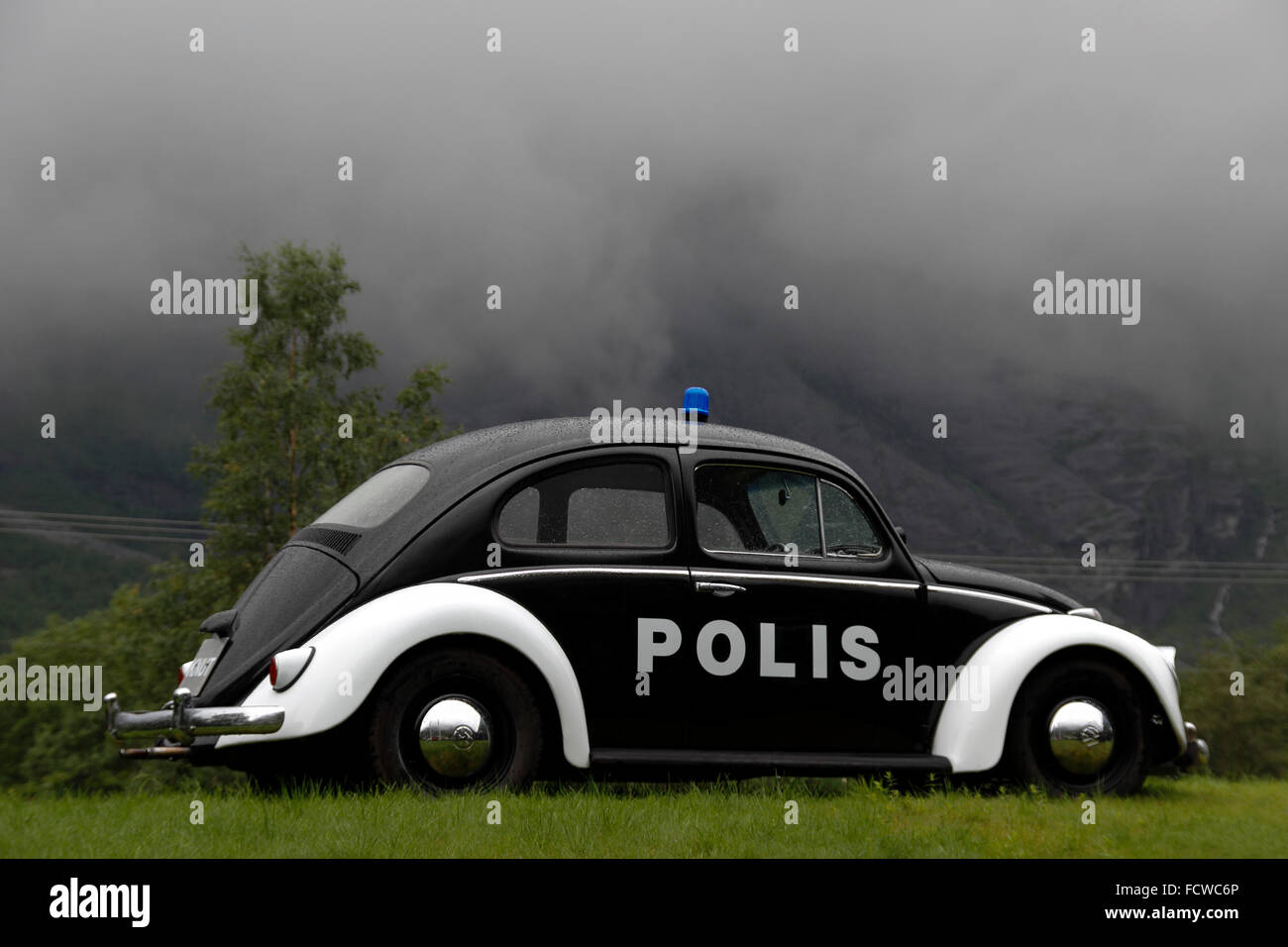 Old fashioned police car near Trollveggen, Norway, Scaninavia, Europe Stock Photo