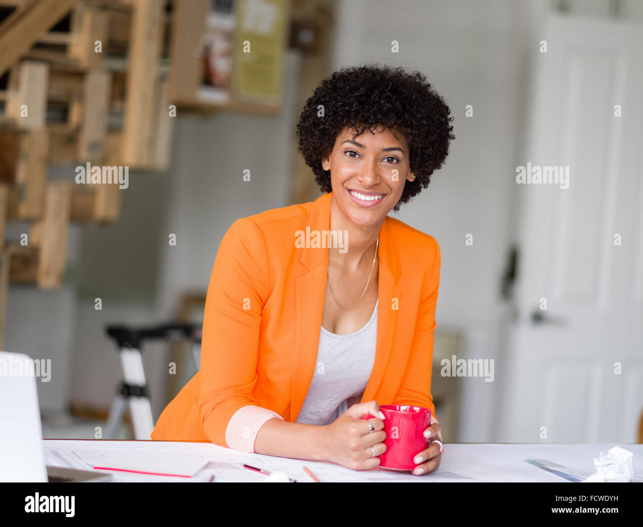 Portrait of young businesswoman in office Stock Photo - Alamy