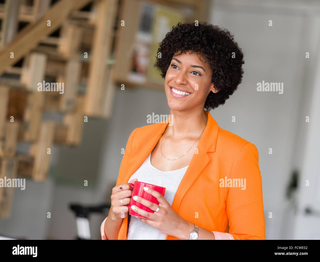 Portrait of young businesswoman in office Stock Photo - Alamy