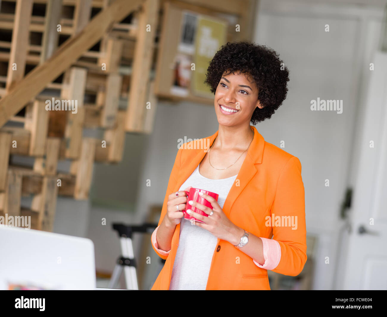 Portrait of young businesswoman in office Stock Photo - Alamy