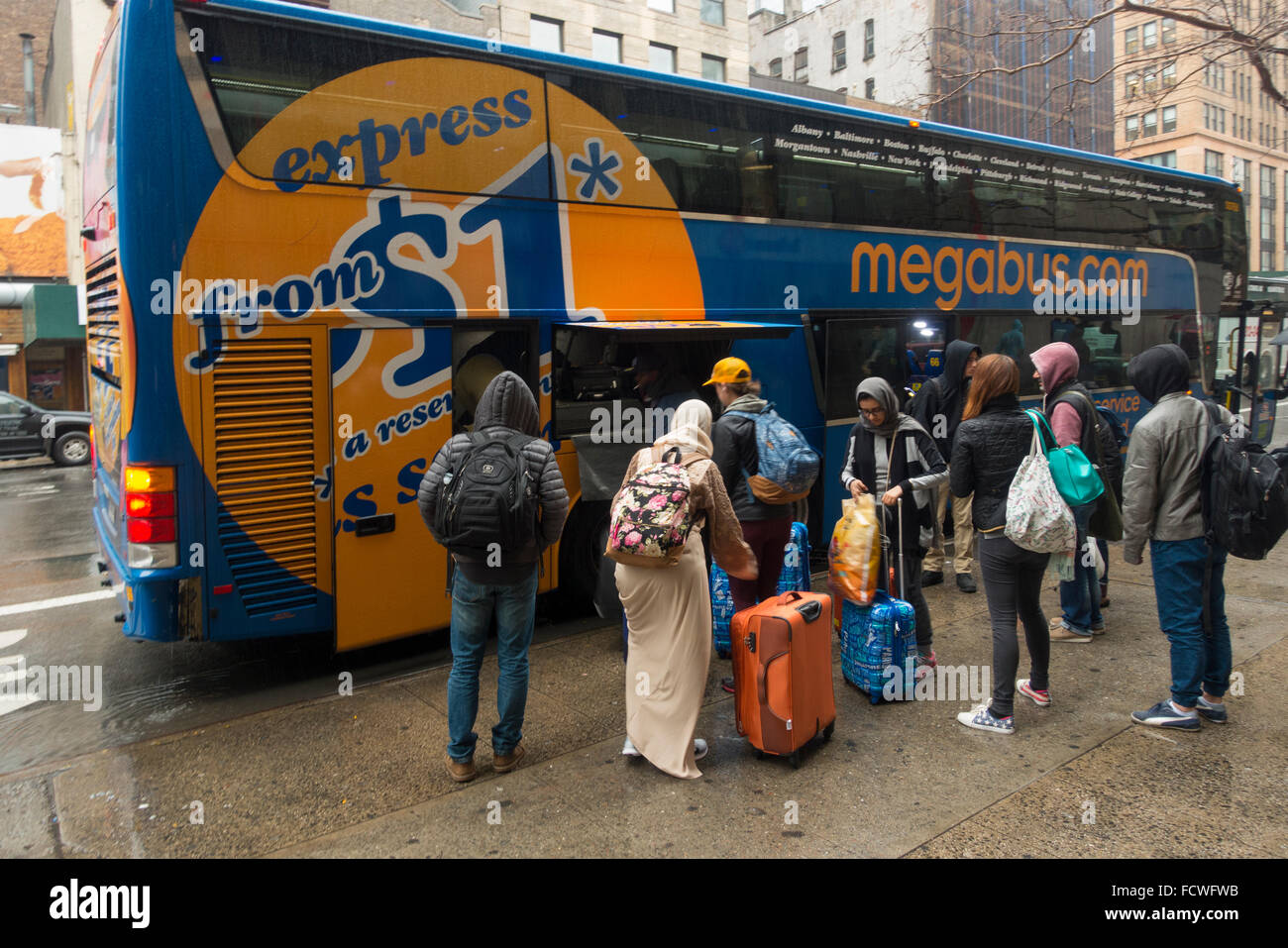 people waiting in line for discount bus service in Manhattan NYC