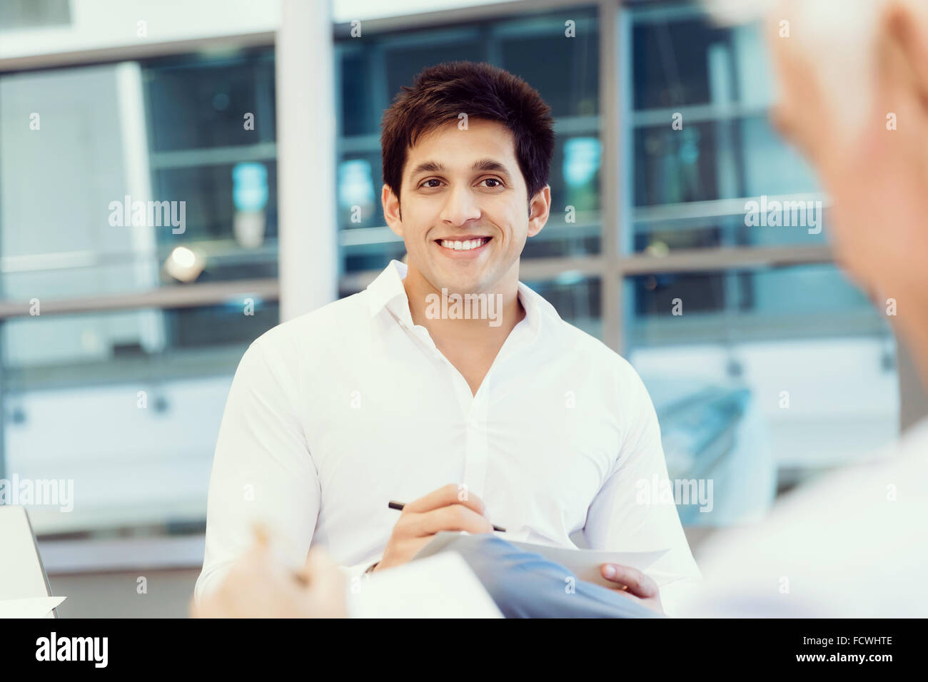 Two men during job interview hi-res stock photography and images - Alamy