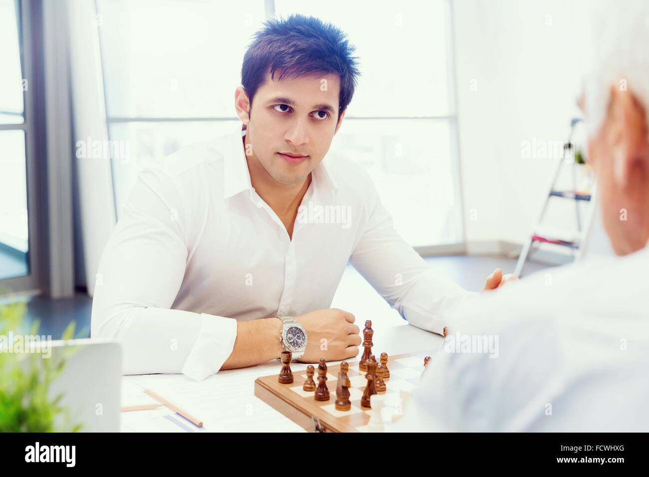 Handshake of businessmen greeting each other Stock Photo - Alamy