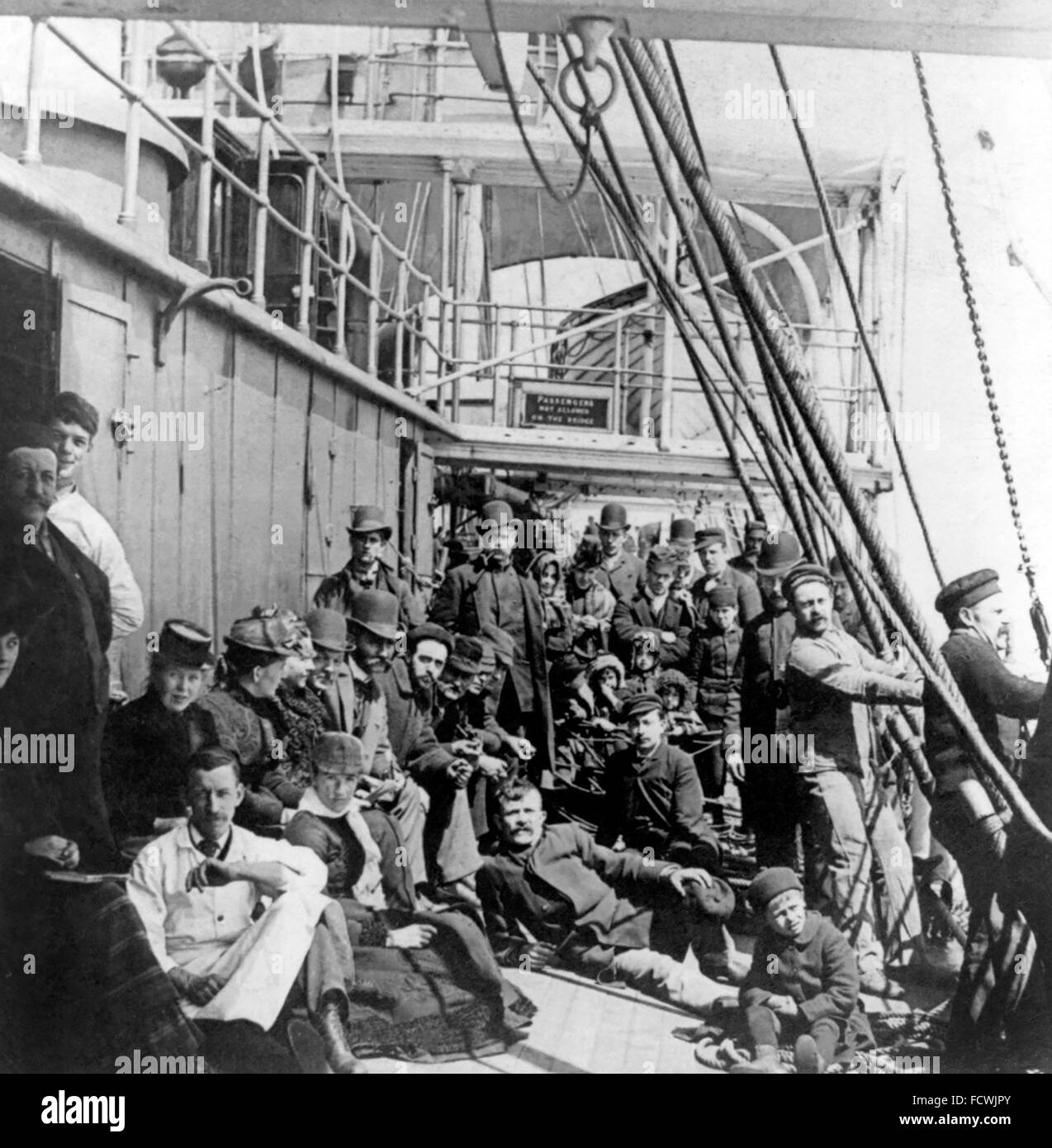 Emigrants to the USA on the lower deck of a ship at sea, c.1890 Stock Photo